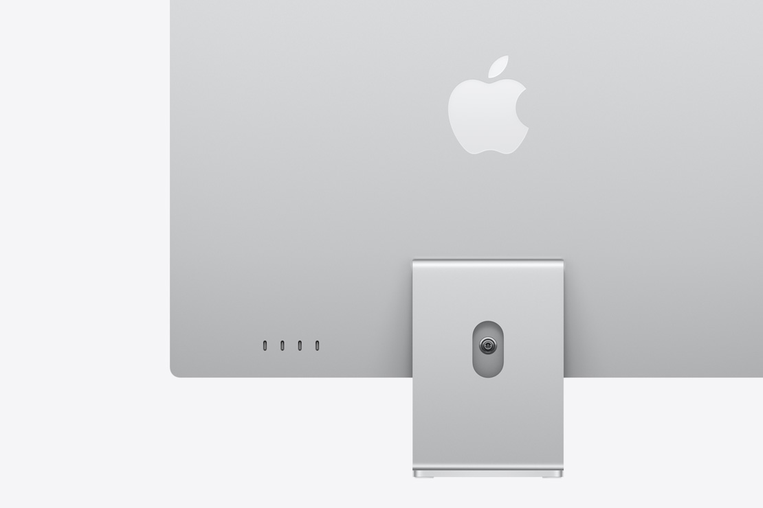 Изглед на сребърен iMac отзад с откроени 4 USB‑C порта