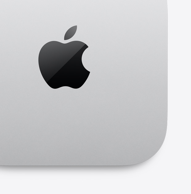 }Вид зверху на сріблястий Mac mini з логотипом Apple